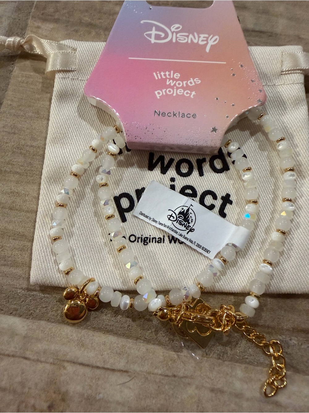 Disney little words project White Beaded Necklace with Gold Mickey Charm Accents